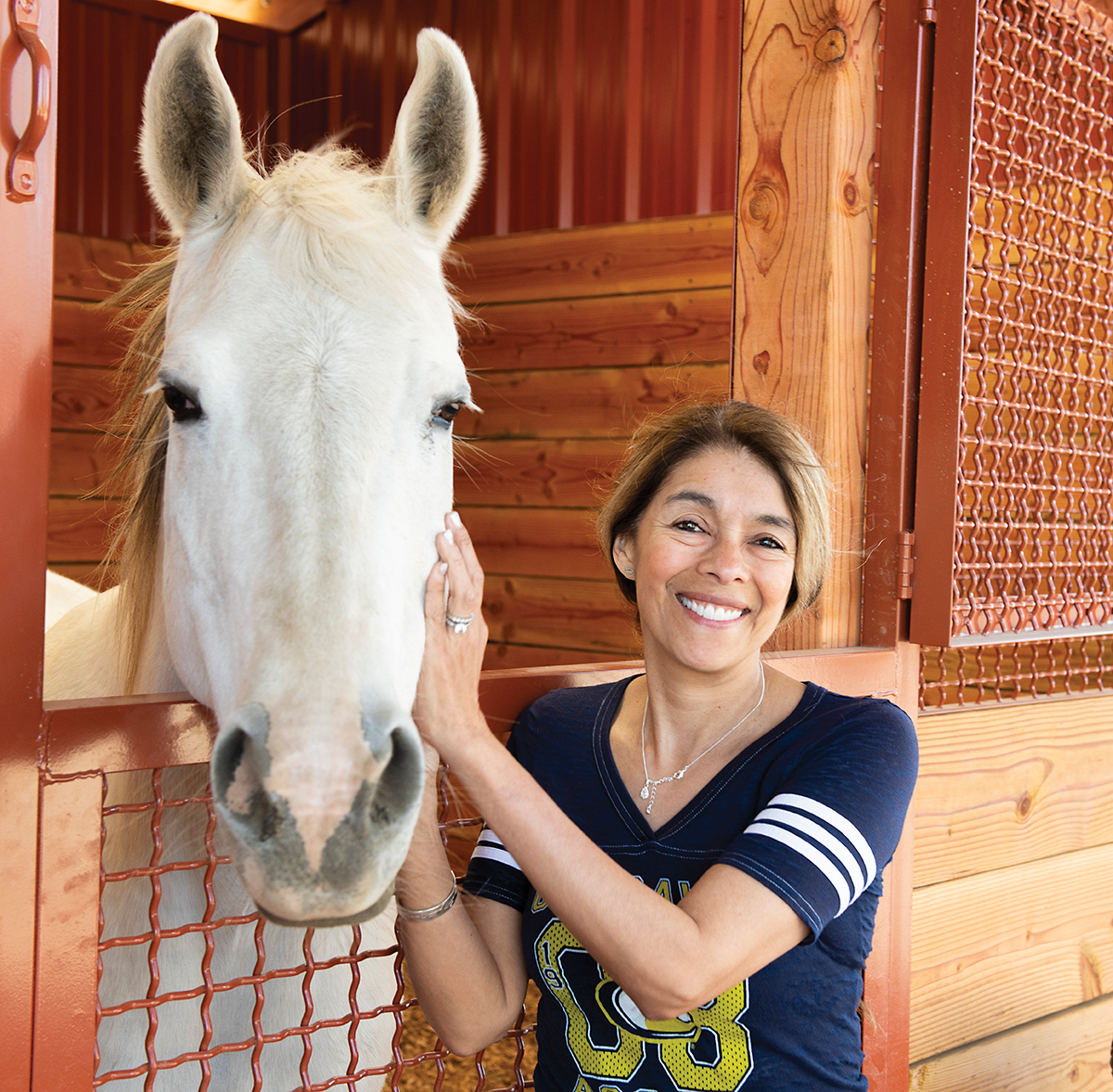 Dr. Monica Aleman with a horse