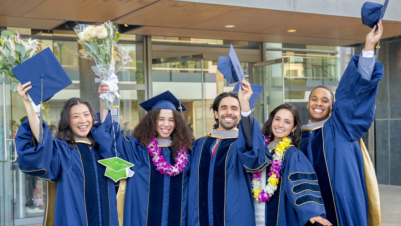 School of Veterinary Medicine Graduates of the Class of 2024 celebrate after the ceremony in front of the Mondavi Center.