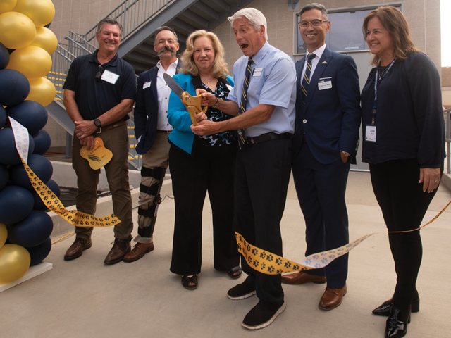 Hospital leadership cut the ribbon at the opening ceremony of the All Species Imaging Center.