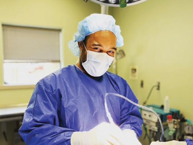 Dr. Sean Gadson performing a procedure.