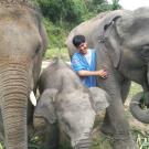 student with elephant