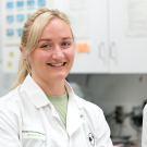 Dr. Alene Pohly with Dr. Steven Kubiski working in the lab.